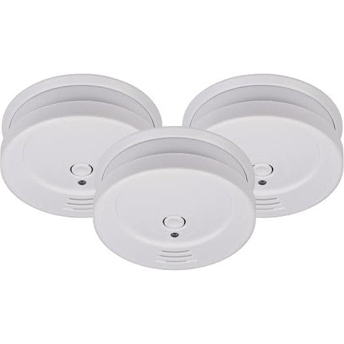 Three white smoke detectors RM C 9010 by Brennenstuhl, featuring replaceable 9 V block batteries and an 85 dB alarm signal for safety in various indoor settings.