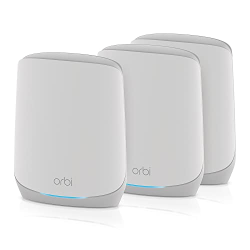 NETGEAR Orbi WiFi 6 Mesh WLAN System RBK763S featuring a main router and two satellite repeaters designed for extensive coverage up to 525 square meters supporting connectivity for up to 75 devices with speeds reaching AX5400 or 5.4 Gbps