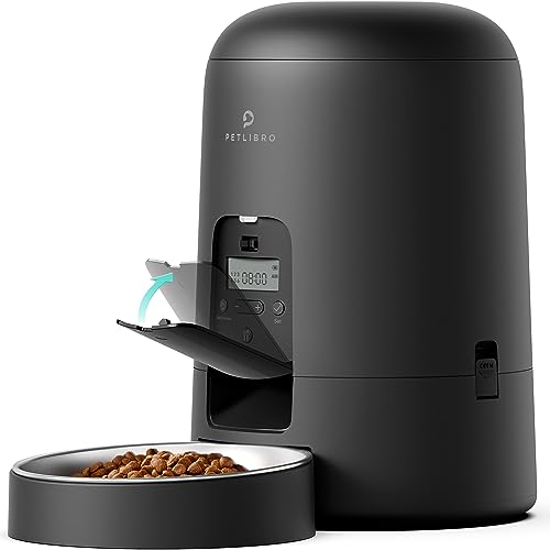 Automatic cat feeder designed for convenience and efficiency featuring a 2-liter capacity, battery-operated with a 180-day battery life, suitable for both cats and dogs, in a sleek black design.