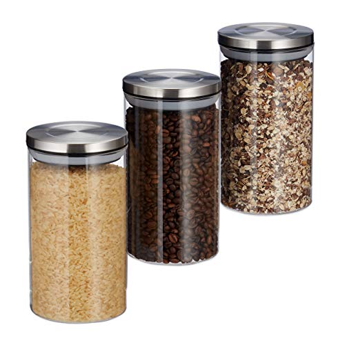 Set of three transparent glass jars with airtight stainless steel lids designed for storing coffee, tea, and sugar in the kitchen, featuring a capacity of one liter each and silicone seals for freshness.