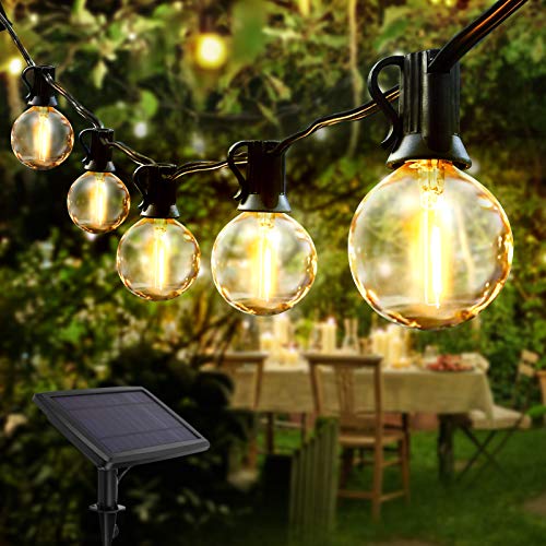 Solar string lights featuring 25 crystal ball LED bulbs on a 7.6 meter length, designed for outdoor use in gardens, patios, and parties, emitting a warm white glow and waterproof for durability.