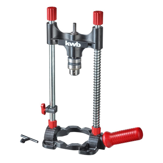 Manual drill stand by kwb with a maximum chuck size of 13 millimeters, featuring a silver color and components including a drill stand, chuck, guide rods, handle, and depth stop. The design includes a straight base plate with six notches for precise drilling on various surfaces and compatibility with drills that have shank sizes from 1.5 to 10 mm. It is suitable for all drill machines and cordless screwdrivers due to its hexagonal mountin.